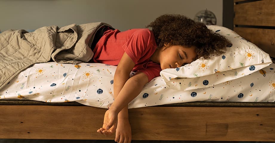 child sleeping in bed 921x4810 1